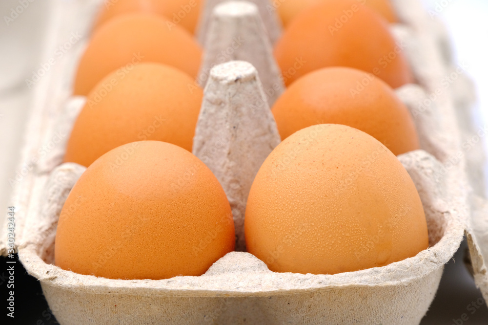 Close-up view of raw chicken eggs on background Close-up view of raw chicken eggs on background