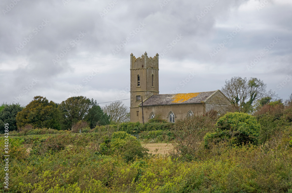 St Mary's church situated on Johns Hill above the estuary at Kieran's Quay in County Wexford on an overcast day in October.