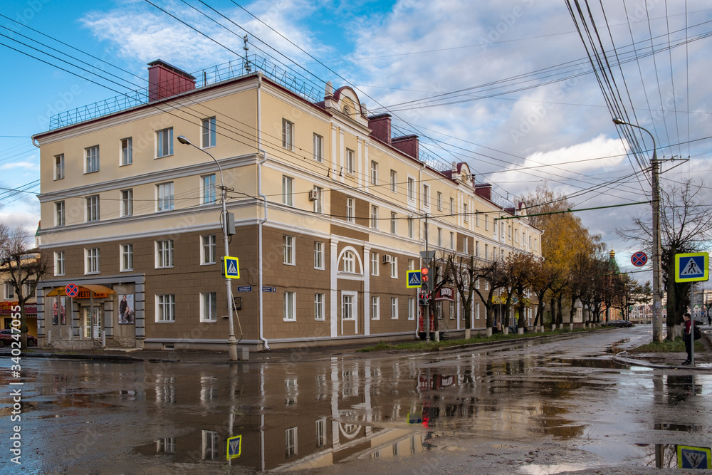Beautiful apartment building, on Pushkin street in Yoshkar-Ola, after the rain.