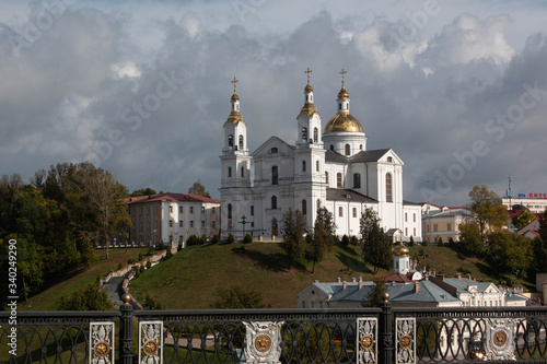 white church with golden domes