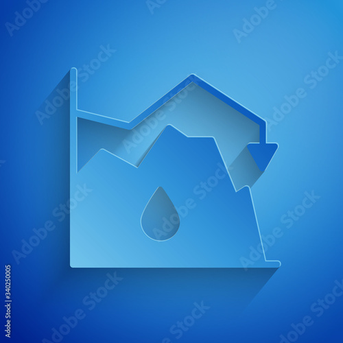 Paper cut Drop in crude oil price icon isolated on blue background. Oil industry crisis concept. Paper art style. Vector Illustration