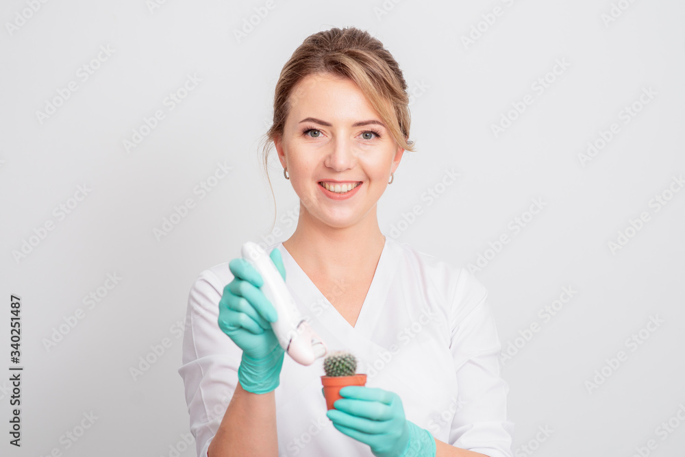 Woman shaves green cactus. Woman shaves green cactus.