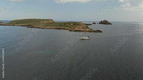 The aerial drone view of the Yacht truck view the port of Addaia, Spain photo