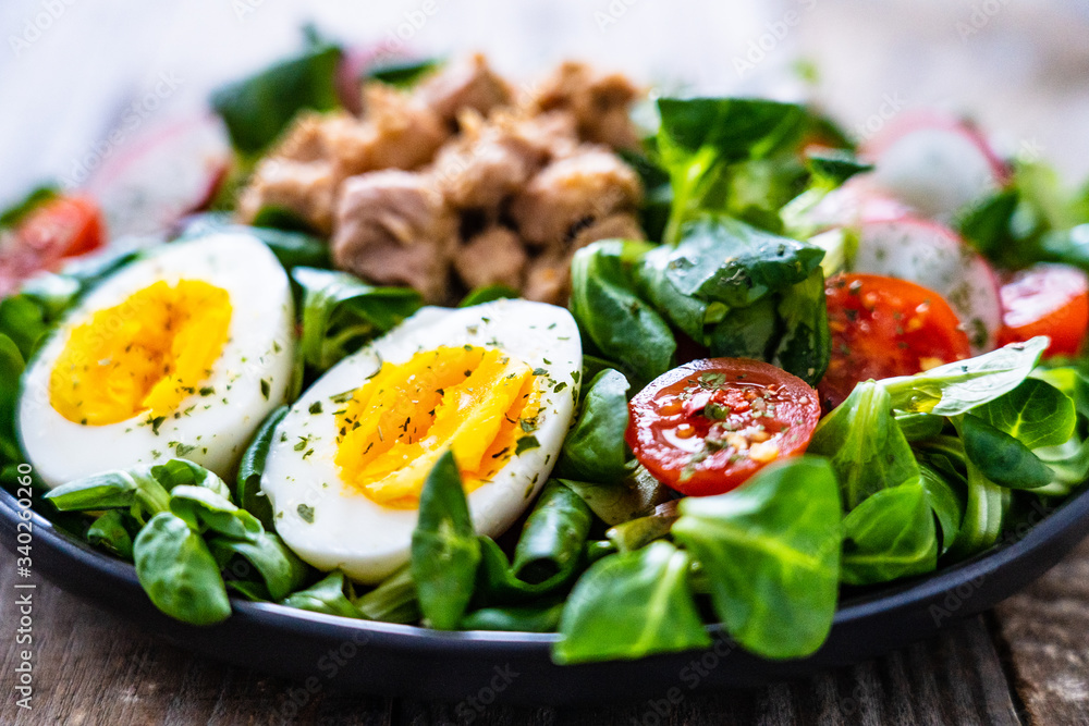 Tuna salad on wooden table