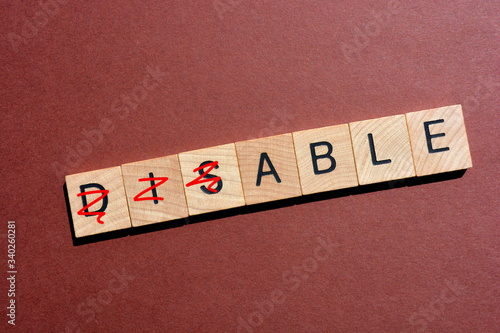 Принти на полотні Disable, with the prefix dis crossed out to leave the word Able