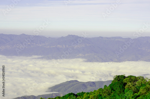 Mountains, skies with sea of mist and green trees