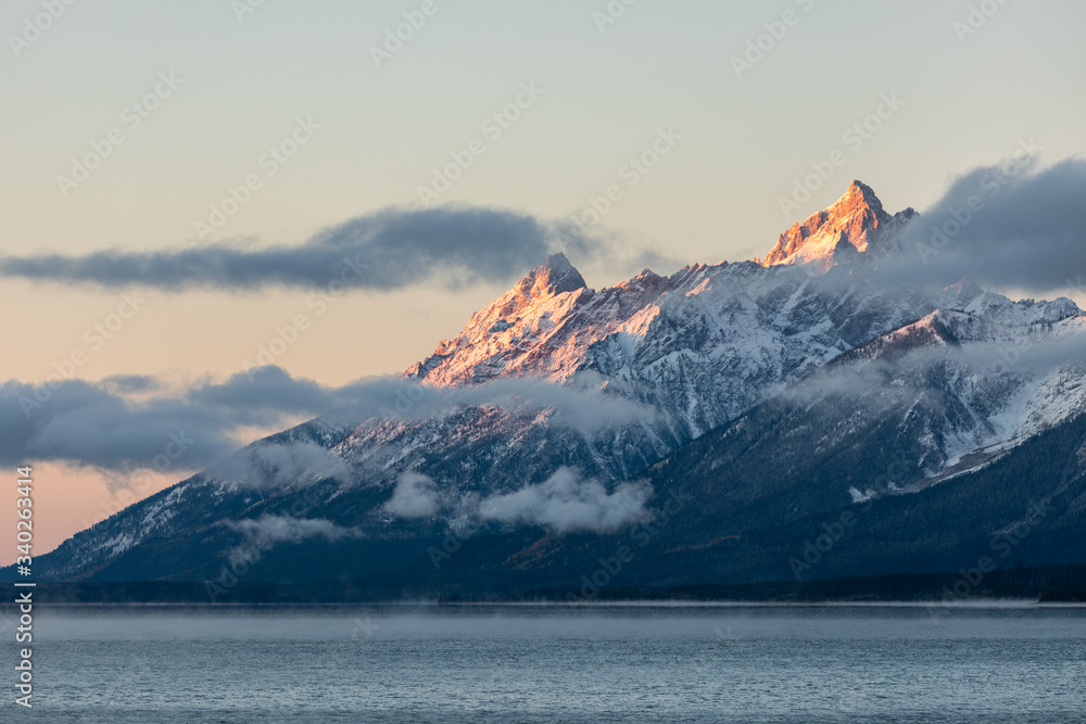 Mountain range covered by snow and cloud at sunrise of Jackson L