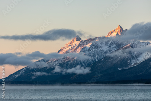 Mountain range covered by snow and cloud at sunrise of Jackson L