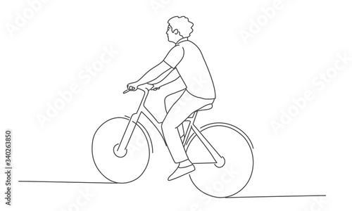 Guy riding a bike. Line drawing vector illustration.