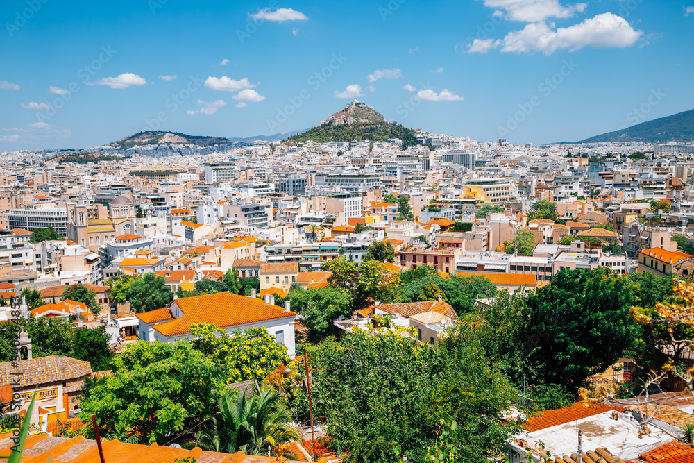 Fototapeta premium Athens cityscape and Lycabettus Hill from Plaka district hill in Athens, Greece
