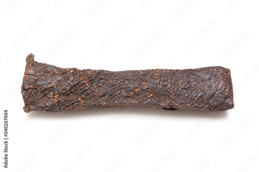 Beef Biltong, South African Beef Jerky isolated on a white studio background. Beef Biltong, South African Beef Jerky isolated on a white studio background.