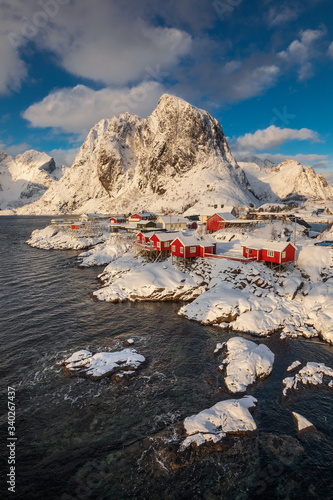 View of amazing Lofoten Islands winter scenery with mountains and fiords in beautiful golden morning light at sunrise, Norway