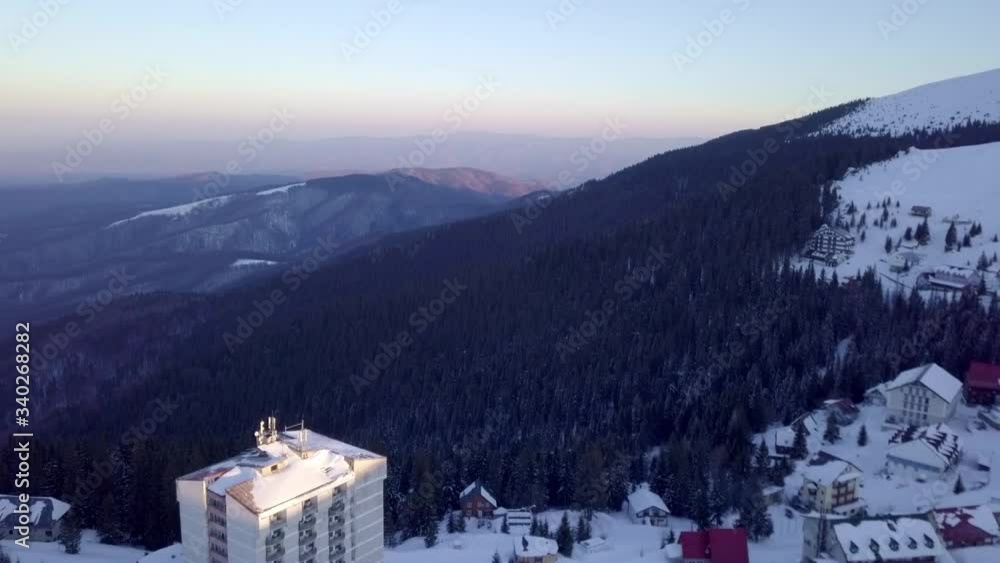 Sunrise over the Muntele Mic Skiresort in Romania - aerial