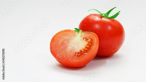 Ripe tomatoes on isolated background