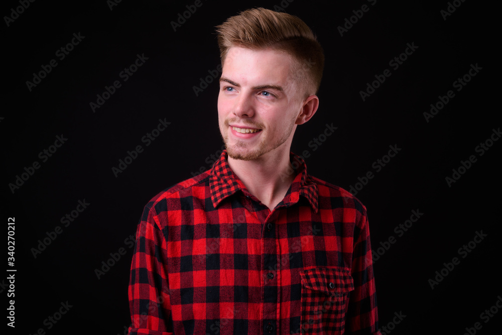 Portrait of young handsome blond bearded hipster man Portrait of young handsome blond bearded hipster man