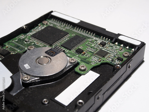 Hard drive, electronic circuit Board close-up. Components of electronic devices, macro photos.