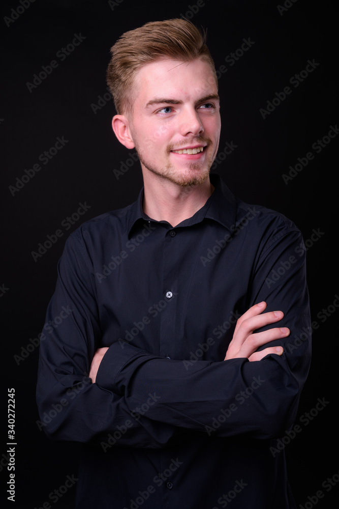 Portrait of young handsome blond bearded businessman Portrait of young handsome blond bearded businessman