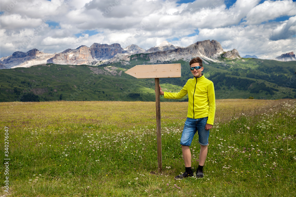 Teenager-Hiker in the summer mountains, Dolomites