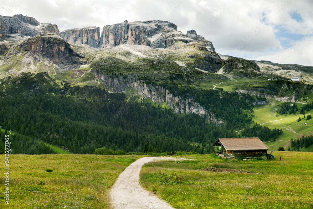 A trail in summer mountains in Italian Dolomites