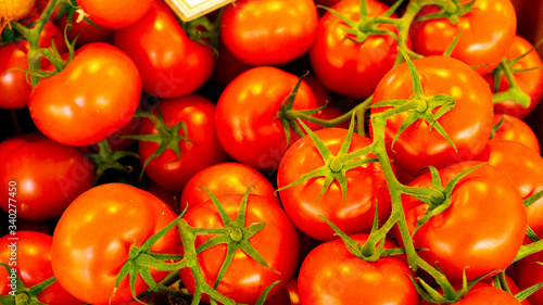 Red fresh tomatoes at market