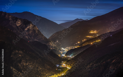 Paisaje del Valle de Sant Julia de Loria de los pirineos de Andorra iluminado al anochecer. photo