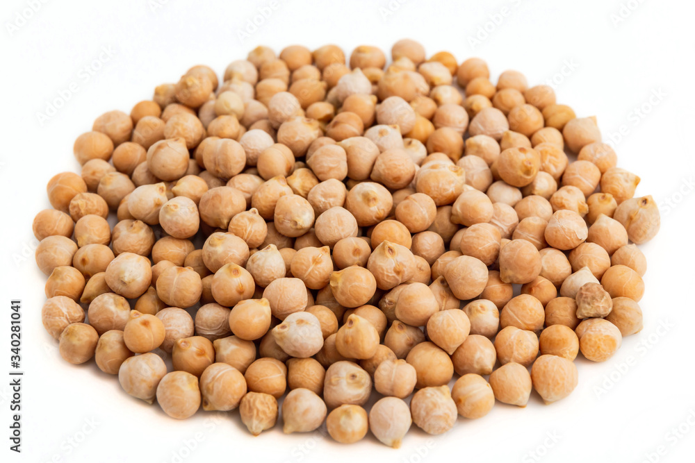 A pile of raw chick-pea on white background A pile of raw chick-pea on white background
