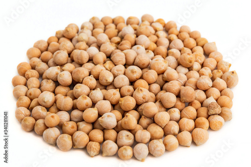 A pile of raw chick-pea on white background