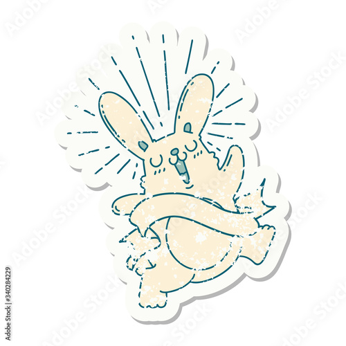 grunge sticker of tattoo style prancing rabbit