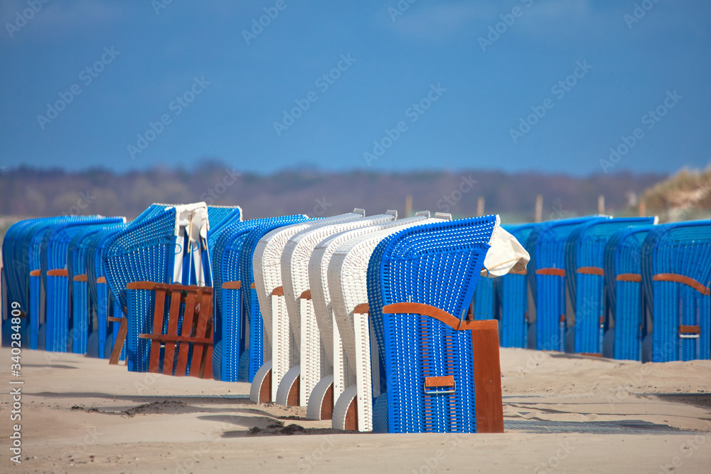 empty beach chairs on the beach on baltic sea