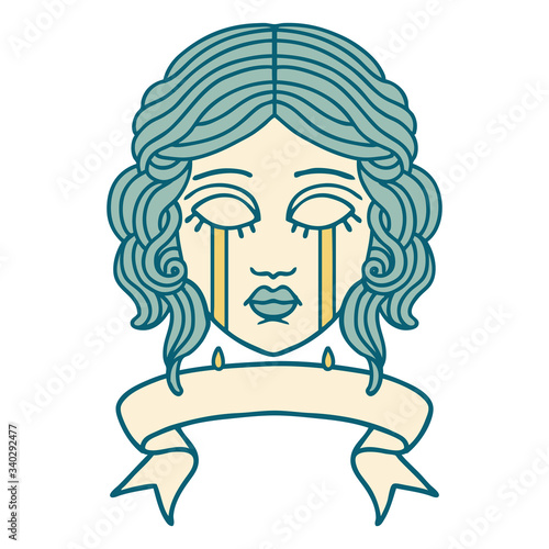 tattoo with banner of female face crying