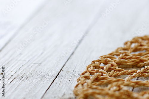 Photos wicker placemat on a wooden table