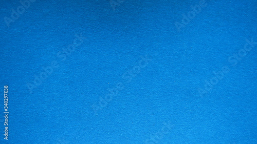 Blue paper texture. Beautiful blue background with a gradient. Illustration can be used as background or layout