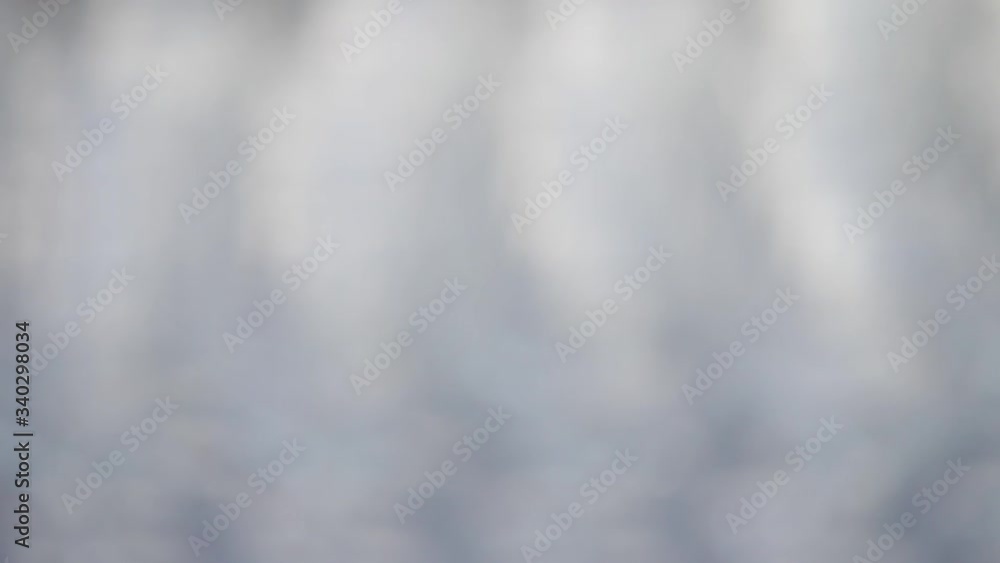 A set of empty transparent wine glasses on high legs sparkle with reflected lights, close-up. A set of empty transparent wine glasses on high legs sparkle with reflected lights, close-up.