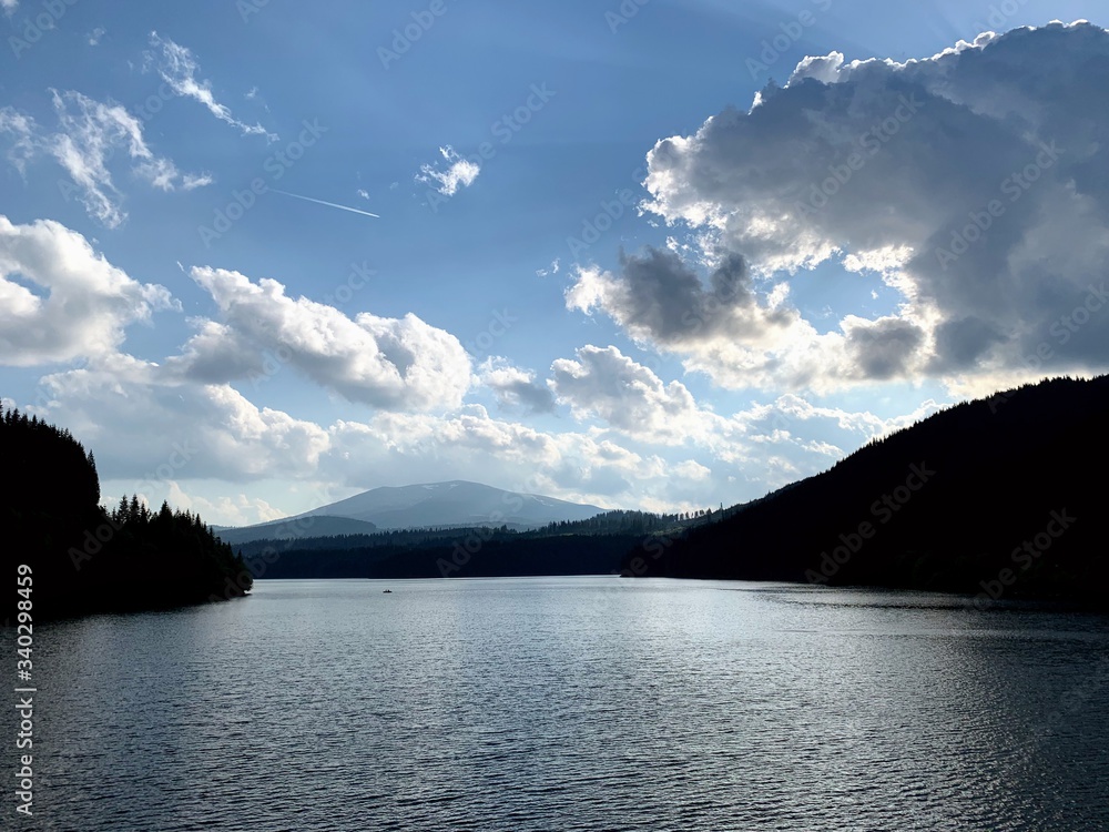 Blue sky and clouds over a lake