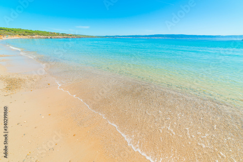 Clear water and golden sand in Lazzaretto beach