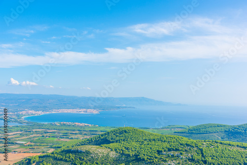 Panoramic view of Alghero coastline on a sunny day