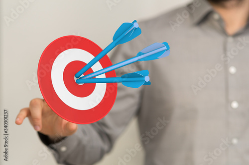 hand holding a target with ...