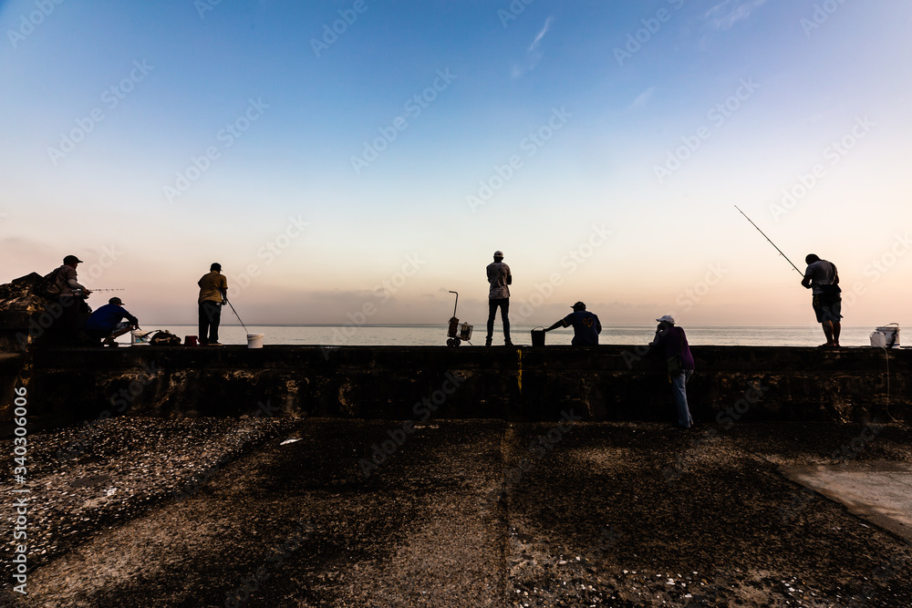 Fishermen, El Malecon waterfront, Havana, Cuba