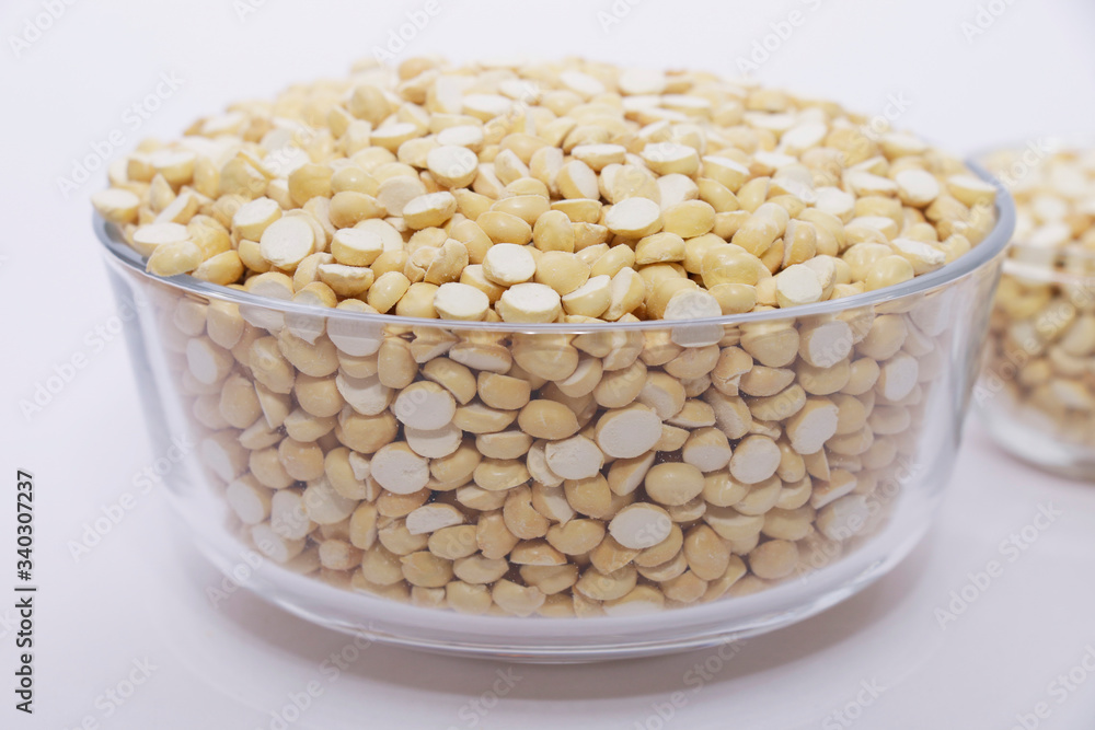 Group of a nutritious roasted gram in a bowl on a white background Group of a nutritious roasted gram in a bowl on a white background