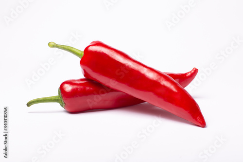 Red sweet capi peppers isolated on white background. Top view