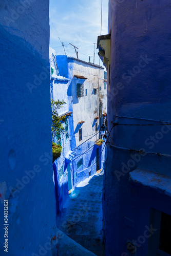 Street scene with blue houses and stairways in Chefchaouen, Morocco © Gert-Jan van Vliet