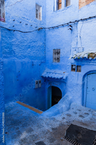 Street scene with blue house and stairway in Chefchaouen, Morocco © Gert-Jan van Vliet