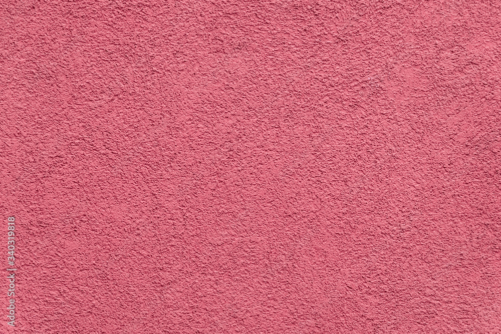 Fototapeta premium Texture of red painted and plastered building facade