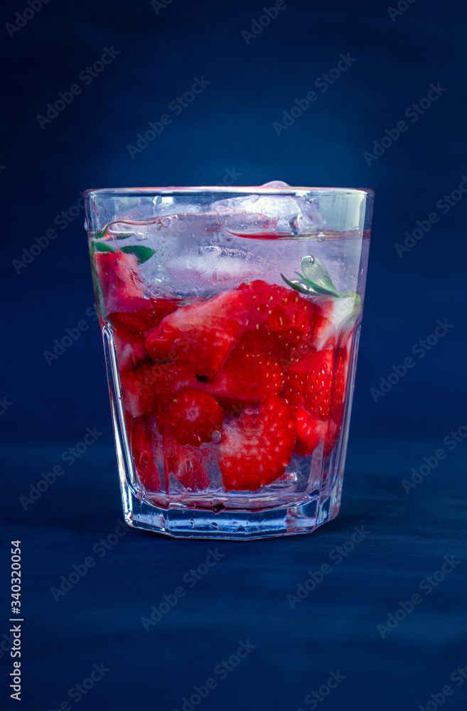 strawberry cocktail with strawberry on a black background strawberry cocktail with strawberry on a black background
