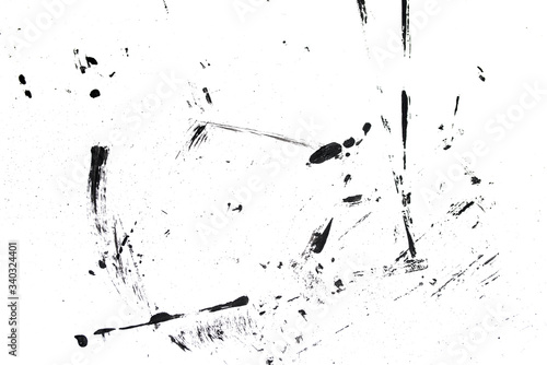 Abstract drops and smears of black acrylic paint isolated on a white background.