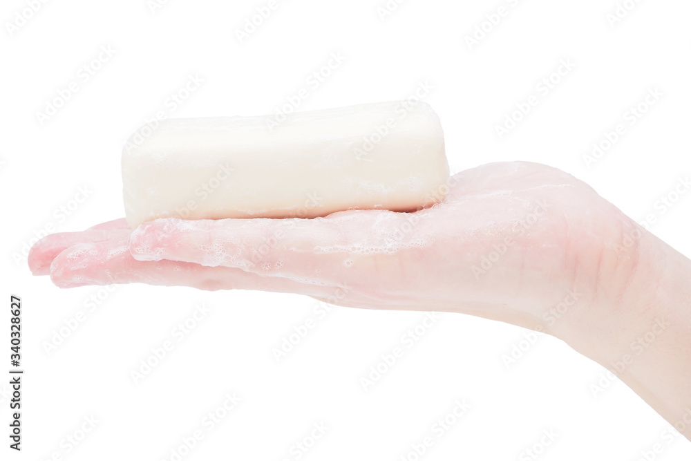 Soap hands holding a bar of soap, closeup, isolate on a white background. Mockup, a place for