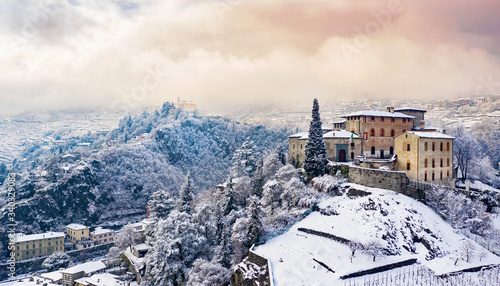 Valtellina (IT) - Sondrio - Panoramic view of the Masegra Castle with whitewashed landscape 