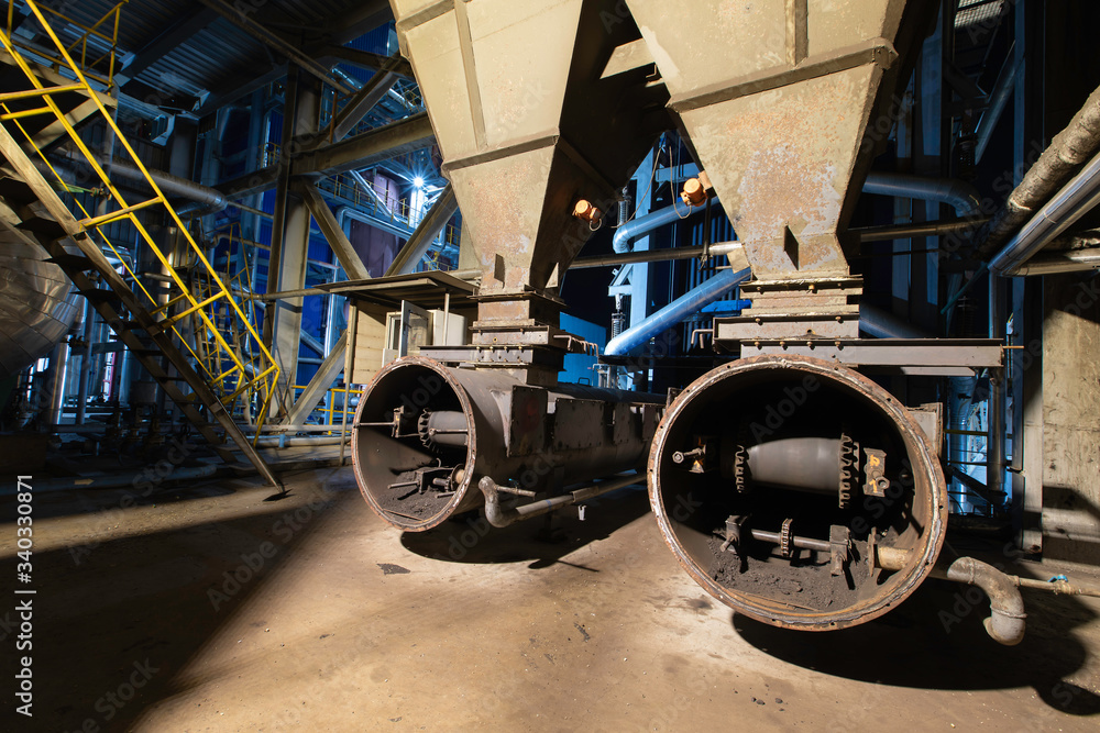 Obraz premium Coal Feeder Conveyor Belt of boiler in Coal power plant factory manufacturing at night.