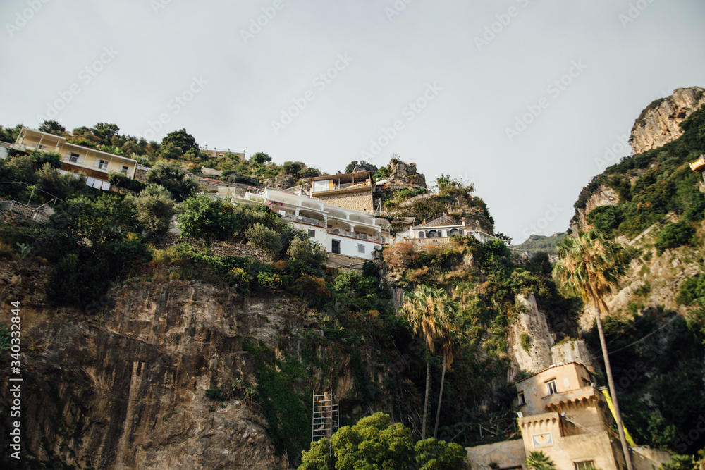 Houses and hotels are built on rocks in Positano and Italy
