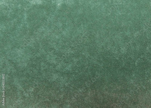 green smooth fabric texture background
